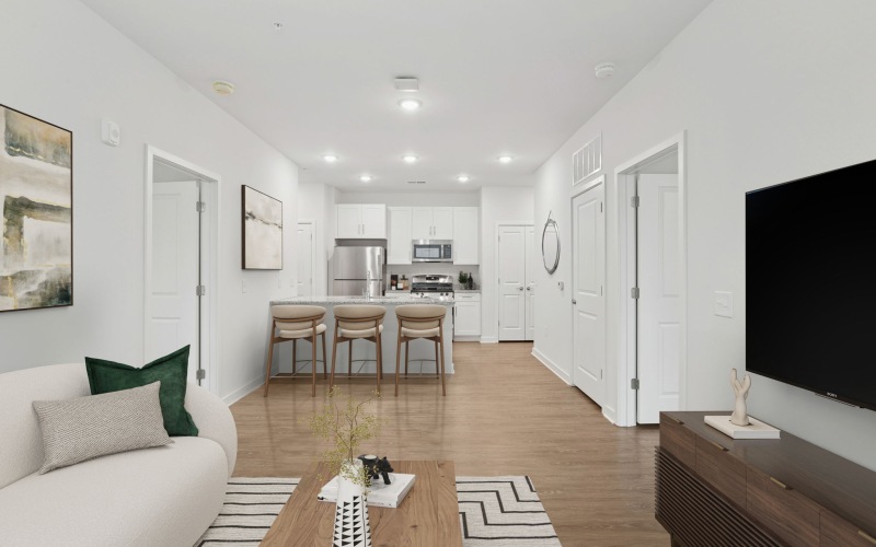 a kitchen with white cabinets